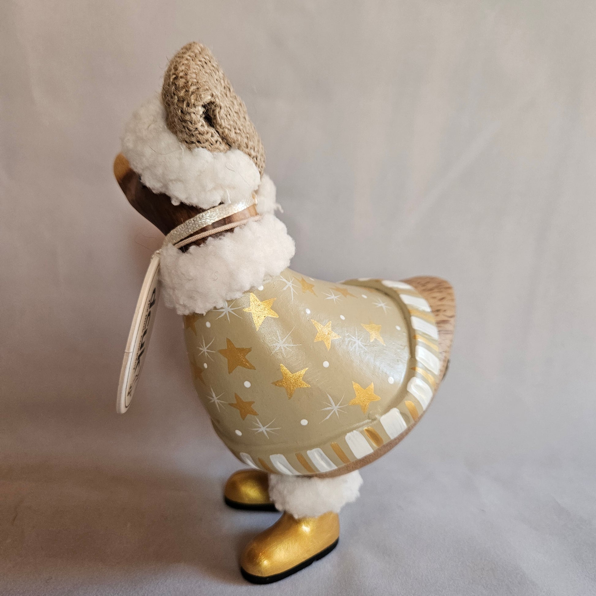 julanka i bambu med ljus dress oh guldstövlar - Naturboden